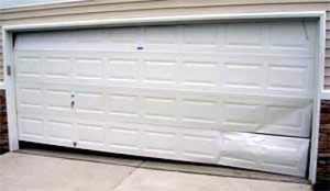 damaged garage door panel